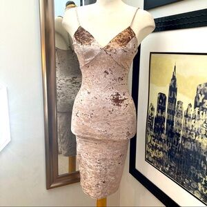 Beige crushed velvet body contouring slip dress.